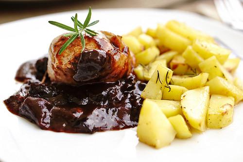 Roasted pork tenderloin with plum-red wine sauce